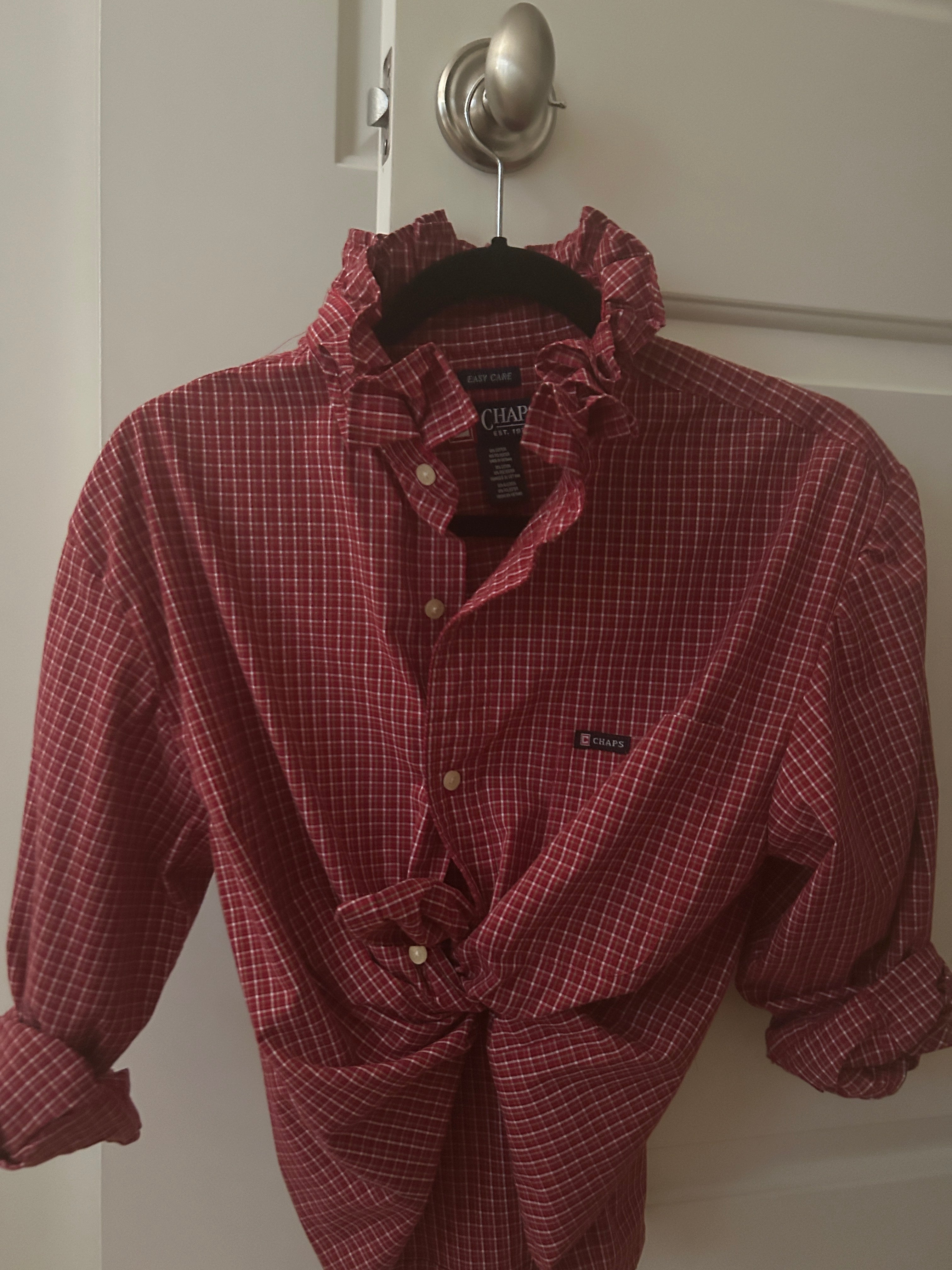 Burgundy plaid Chaps ruffled collar top on hanger with front knot detail