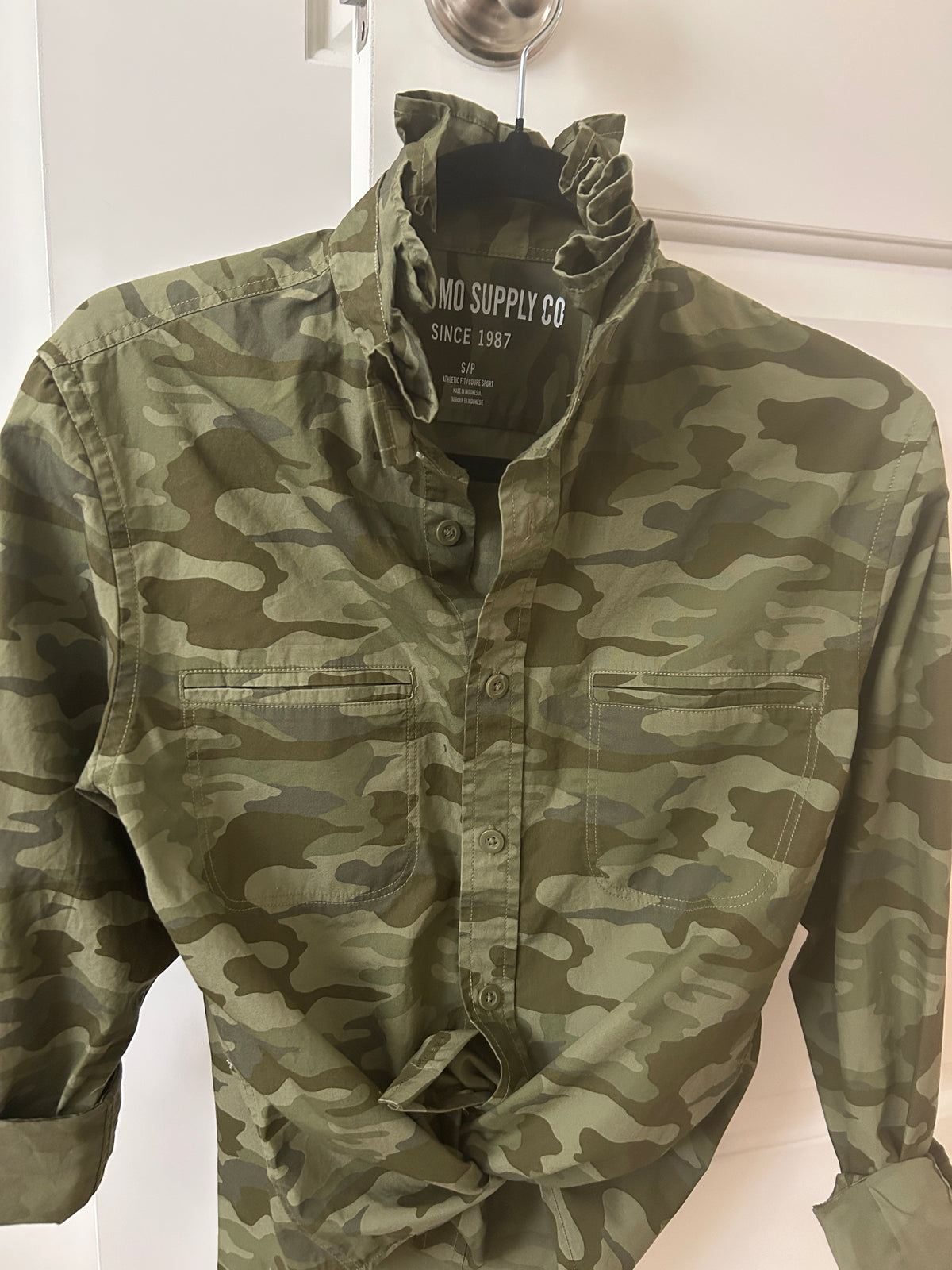Meet Jen , beautiful camo shirt with long sleeves and ruffled collar