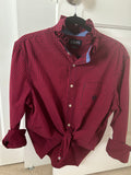Ali, the long sleeve red and navy gingham shirt with a ruffled collar