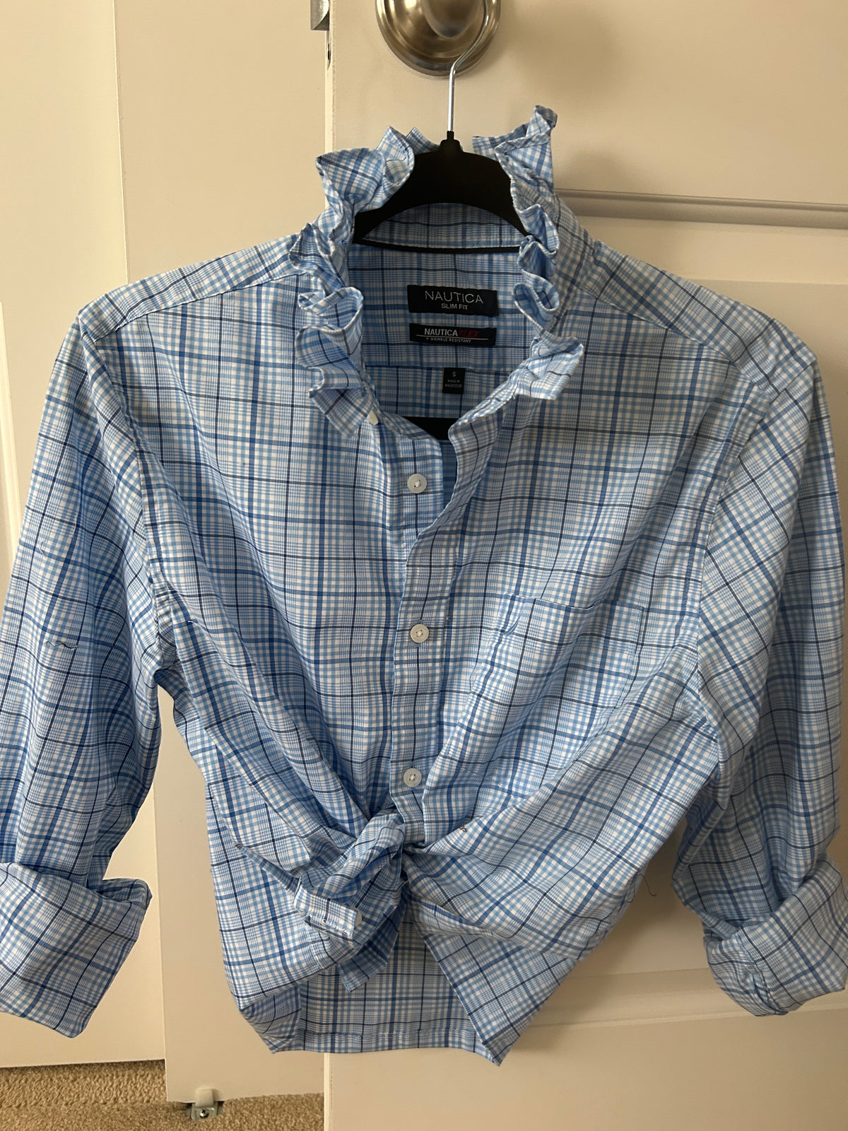 Anna is a one of a kind beauty! light blue plaid long sleeve shirt with ruffled collar
